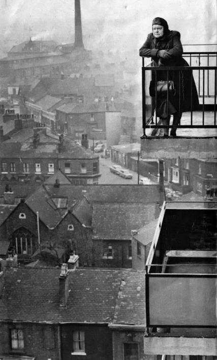 actress-violet-carson-on-a-balcony-looking-out-over-manchester-in-the-early-60s-photograph-by-john-c-madden